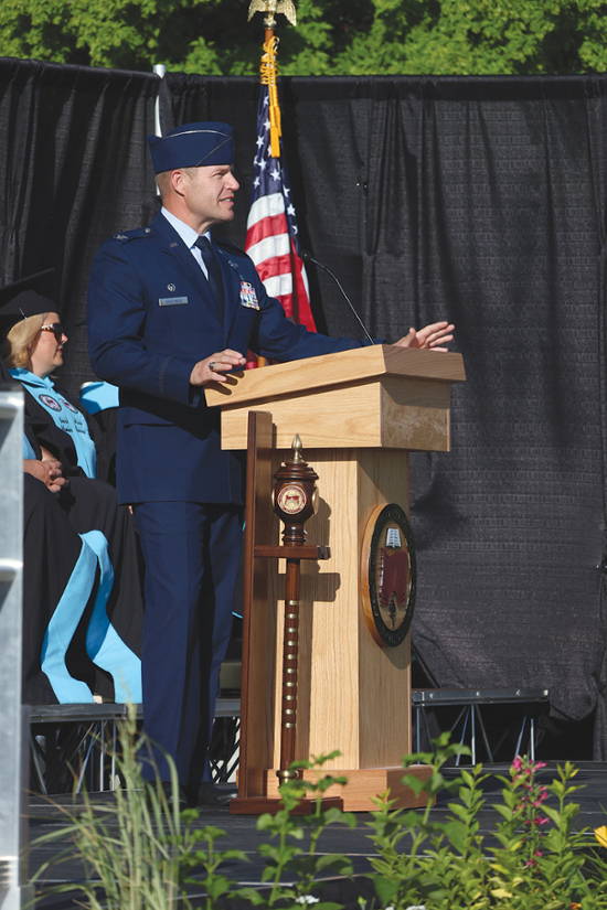     Doug Halverson/KCC photo Keynote speaker Col. Adam Gaudinski, commander of Kingsley Air Base,  told the graduates that learning doesn’t stop with a diploma.