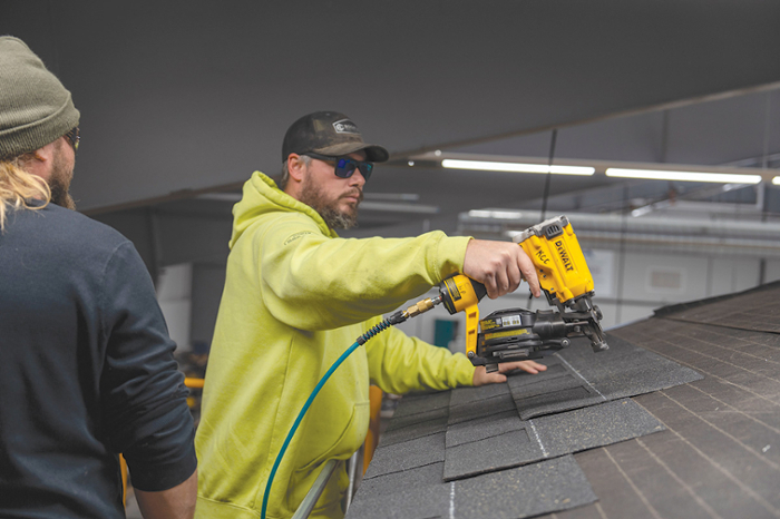 Caleb Herrera/KCC photo Klamath Community College students in the Apprenticeship and building trades learn the basics of roofing during a recent workshop. Consistency in construction is key to the instructions, according to Mark Griffith, Apprenticeship Program director.