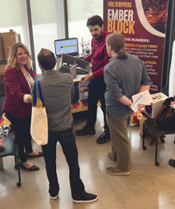 At left isThe team speaks with judges about the ember block during a three-hour session.