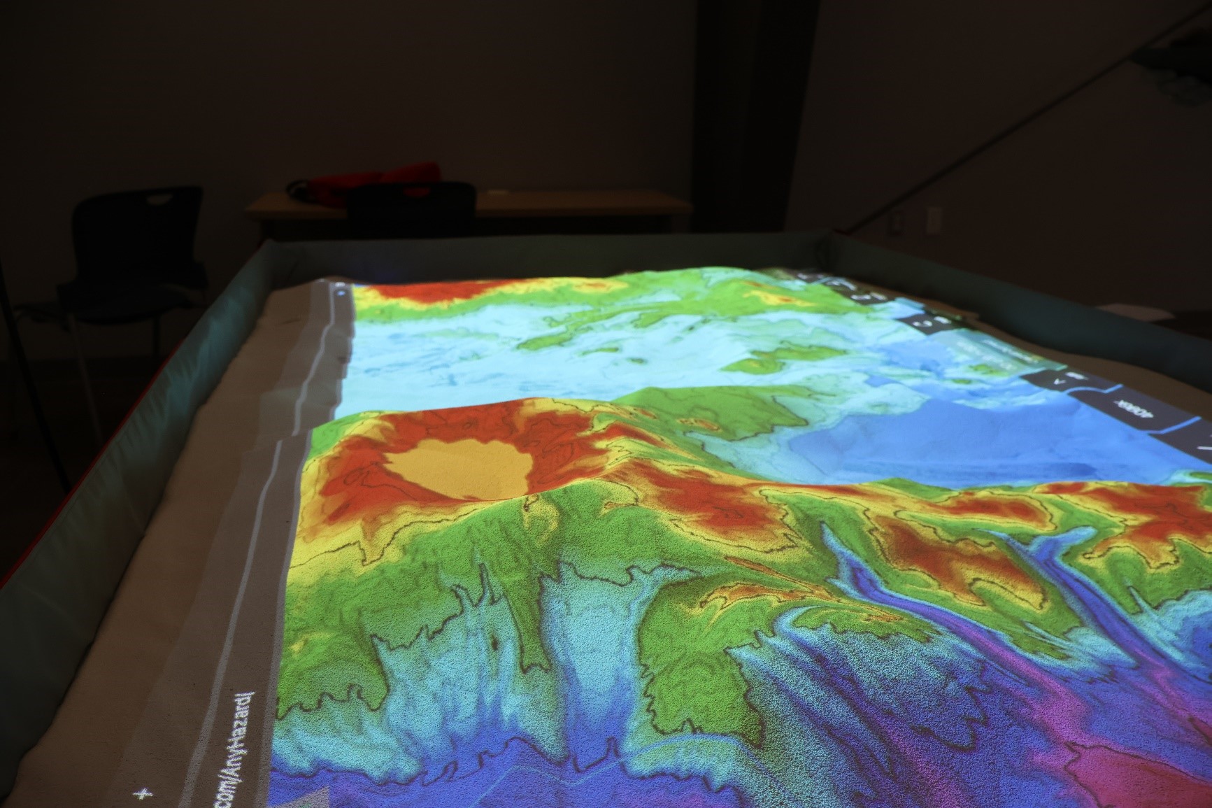 Klamath Community College has a new simtable, an interactive computer-generated view of forested terrain, such as Crater Lake above, that can be used to predict fire behavior and help plan for wildfire-fighting efforts and evacuations.