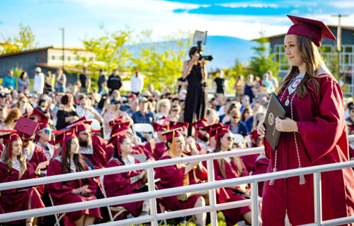 Graduating student holding a diploma