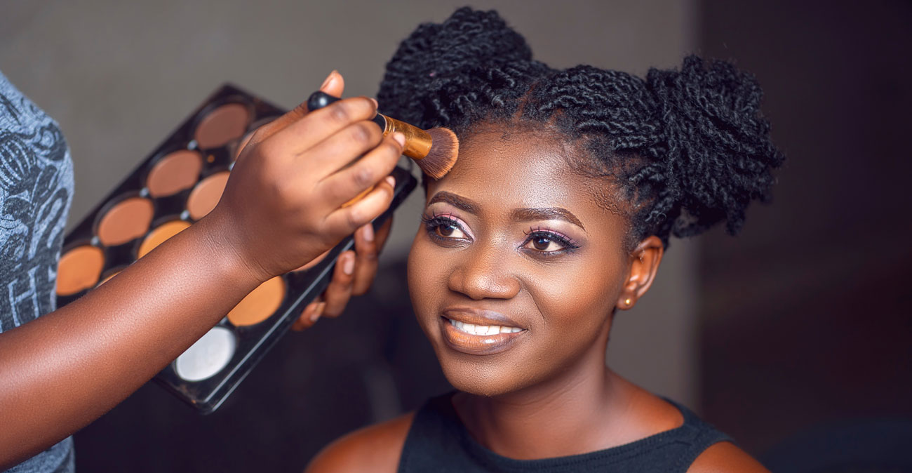 Makeup artist applying makeup