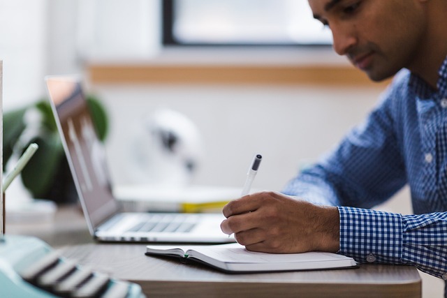 Healthcare administrative professional working with digital records